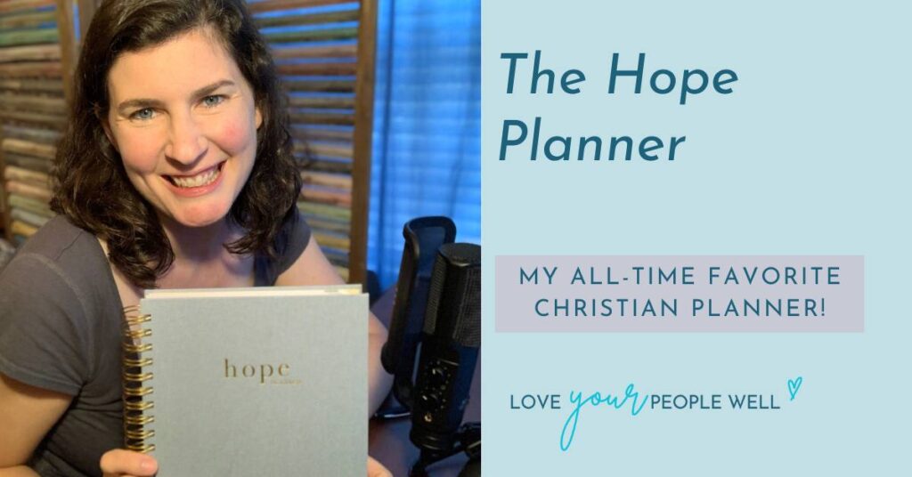 Jessica Hayes, LPC, LMFT holding a copy of her all-time favorite best Christian planner - The Hope Planner.